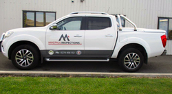 Mike Paul Inspections branded vehicle parked outside a Whanganui property